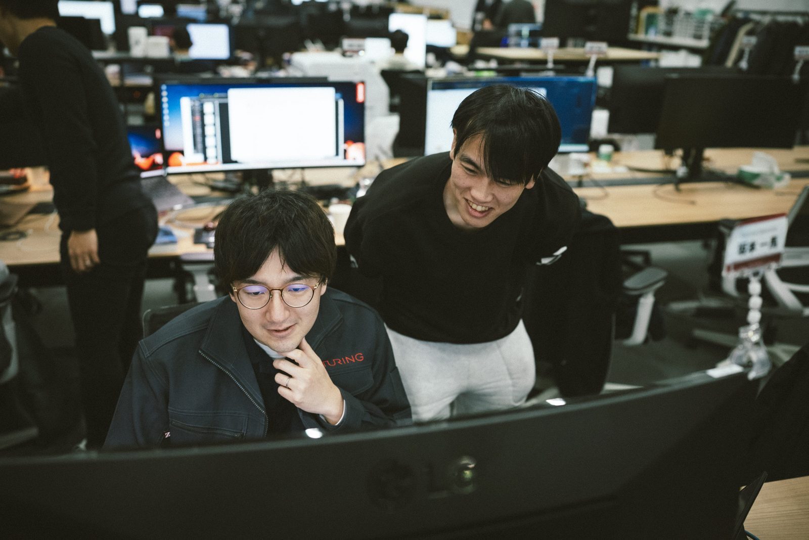 エンジニアと走行状況を共有するメンバー